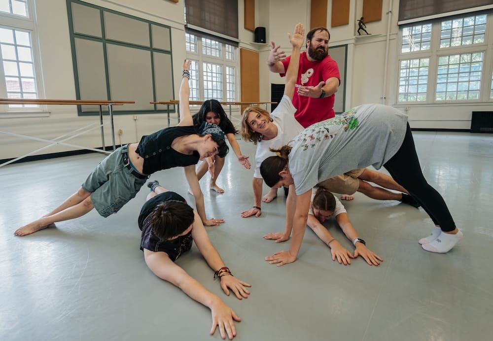 Summer Arts Clinic students rehearse a student-choreographed dance in their modern dance class.