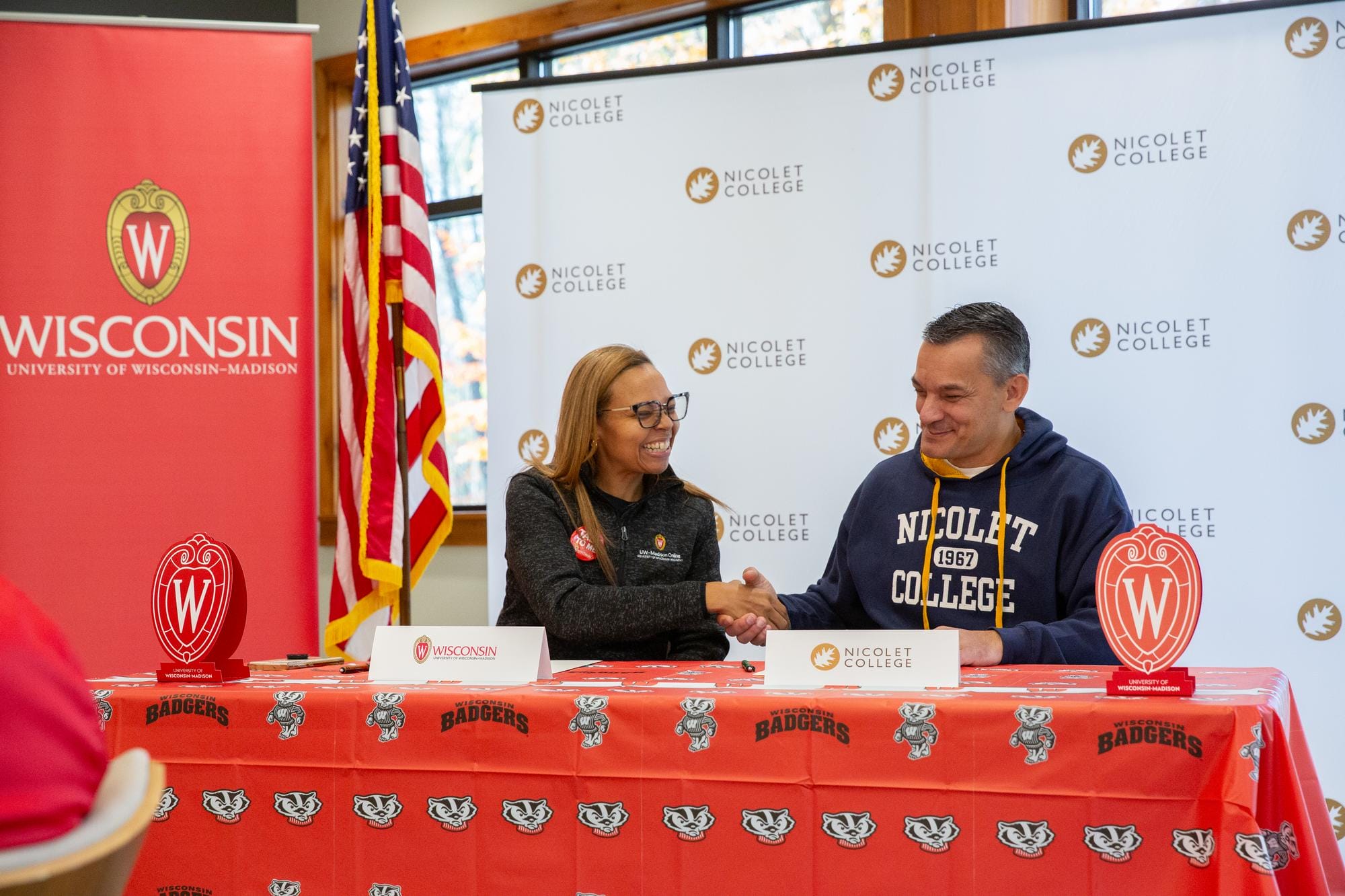 Dr. Maya Evans, internal education consultant and program director of UW–Madison Online, and Gary Zarda, Nicolet College dean of University Transfer, Liberal Arts and Science, celebrated the signing of the transfer agreement between Nicolet College and UW–Madison Online, paving the way for students to complete their bachelor's degrees without leaving the Northwoods.