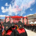 Badger graduates in caps and gowns