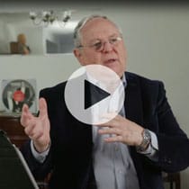 Bill Richardson with play button to video