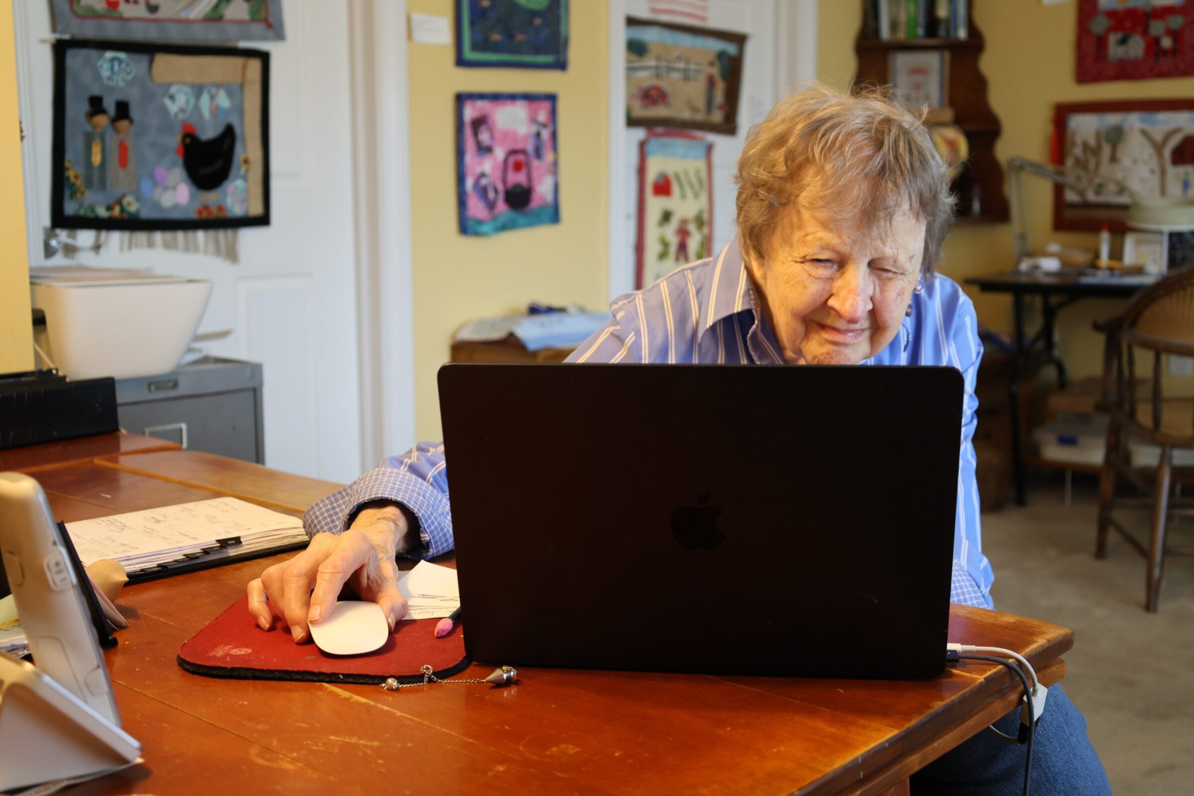 Marge Engelman on her laptop