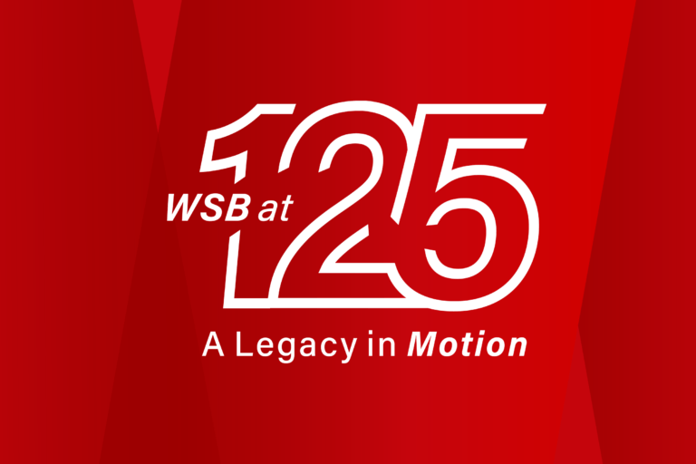 Red banner with white lettering for WSB's 125 "legacy in motion" anniversary