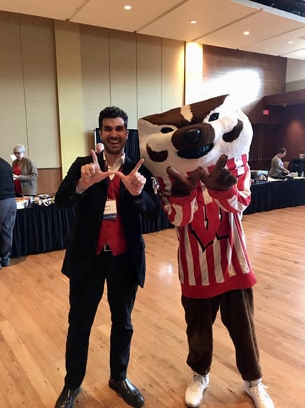 Alex with Bucky at the Adult Career and Special Student Services award ceremony