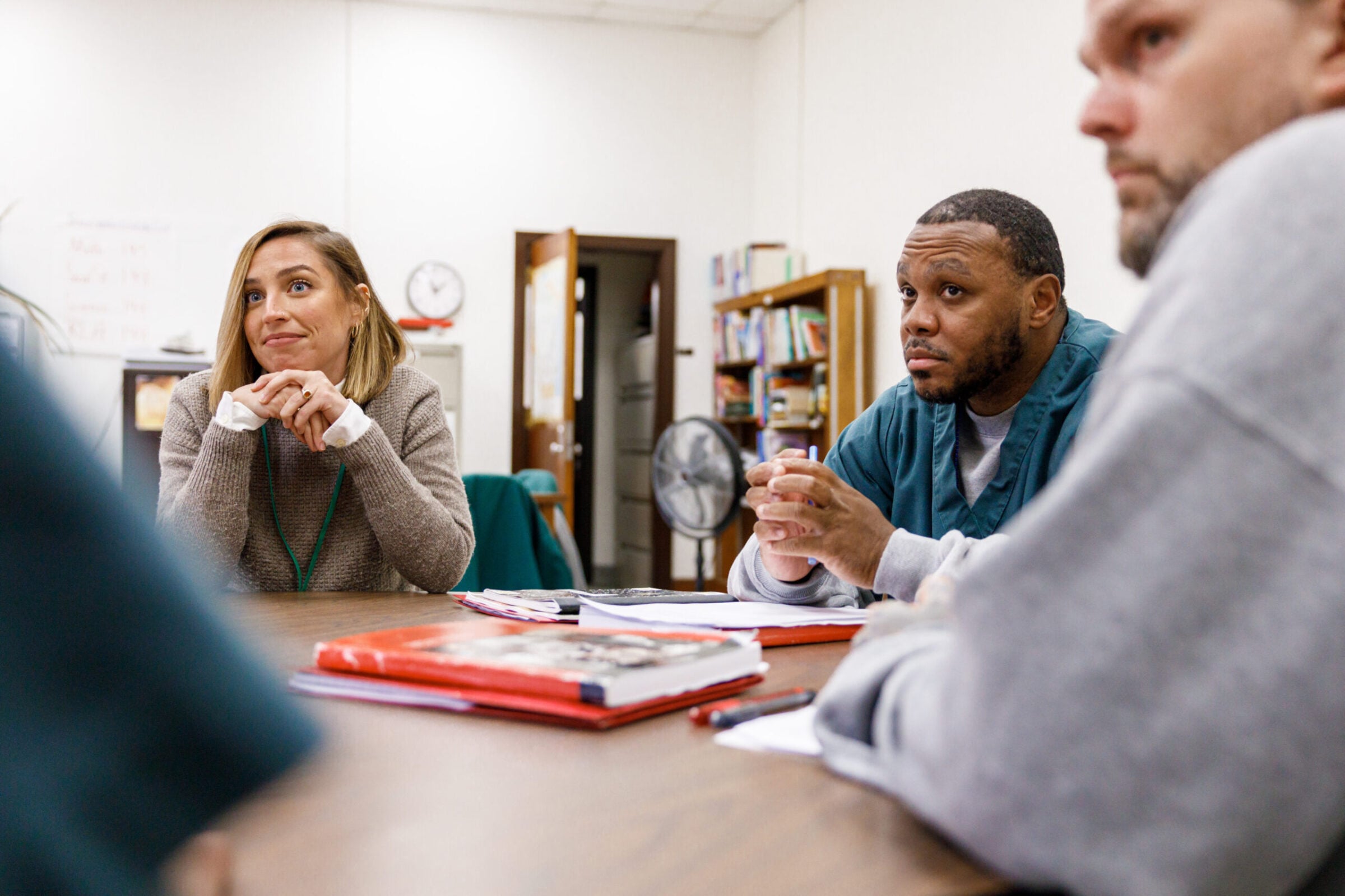 PEI participating students having a conversation with an instructor